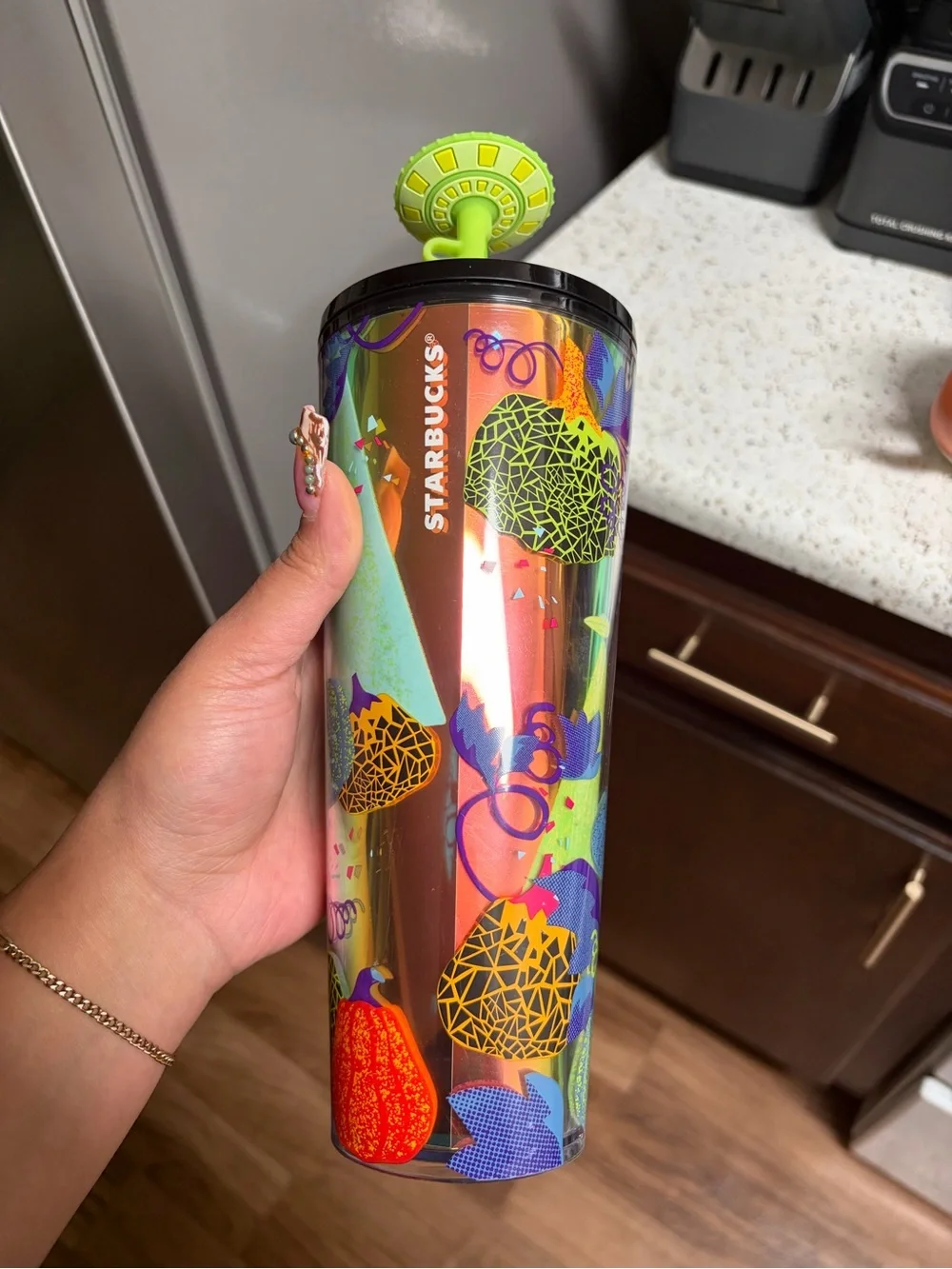 Starbucks Iridescent Tumbler with Neon Green Lid and Multi-Color Fruit Motifs